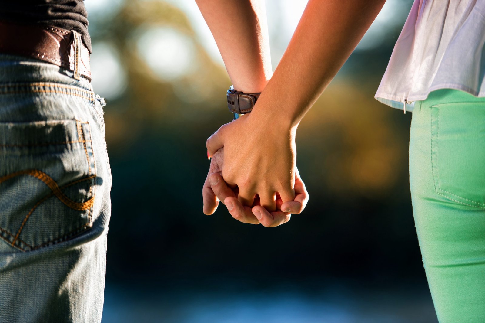 Couple holding hands